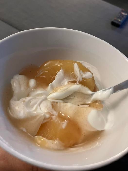 Sugar-free apple pie filling on top of plain Greek yogurt.